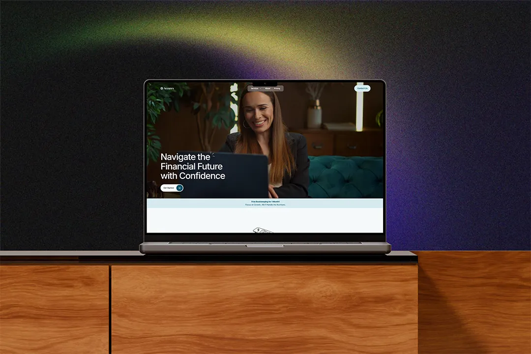 A MacBook on a wooden table showcasing Accurex Website